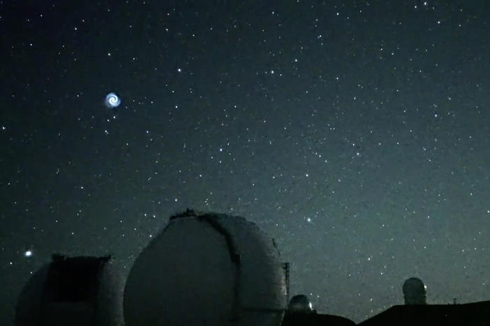 A "mysterious" flying spiral spotted by the Subaru Telescope on Mauna Kea, Hawaii, early on Jan. 18, could be related to a SpaceX satellite launch earlier in the day, scientists speculated.