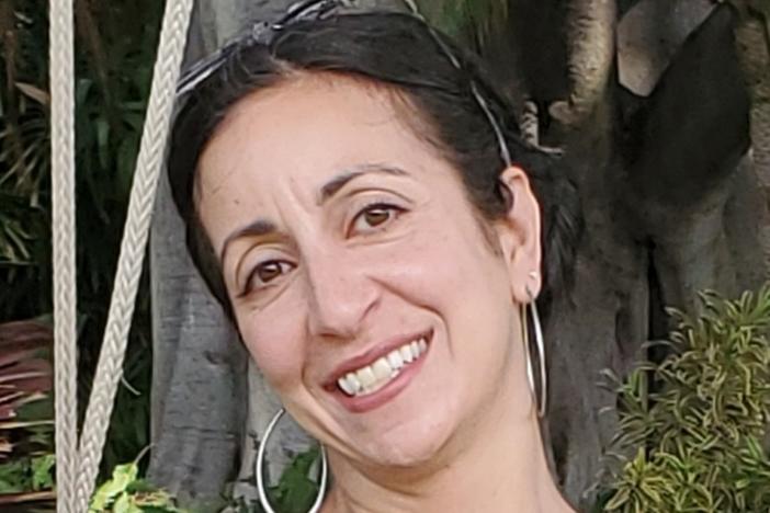 When Nicole George-O'Brien was experiencing a seizure while driving over a bridge, a stranger jumped into action to make sure she and others on the road that day were safe.