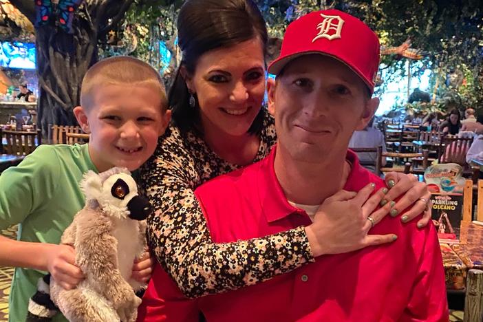 Betsy Cox with her husband, Steve, and their son, Blake.