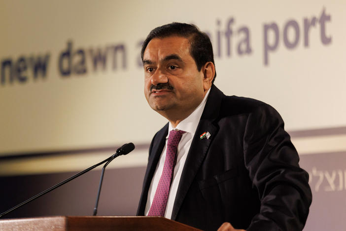 Gautam Adani, billionaire and chairman of Adani Group, speaks during an event at Israel's Port of Haifa, on Tuesday. The Indian billionaire, whose business empire was rocked by allegations of fraud by short seller Hindenburg Research, said his company will make more investments in Israel.
