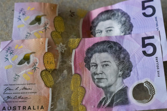 Australian $5 notes are pictured in Sydney on Sept. 10, 2022. King Charles III won't feature on Australia's new $5 bill, the nation's central bank announced Thursday, Feb. 2, 2023, signaling a phasing out of the British monarchy from Australian bank notes, although he is still expected to feature on coins.