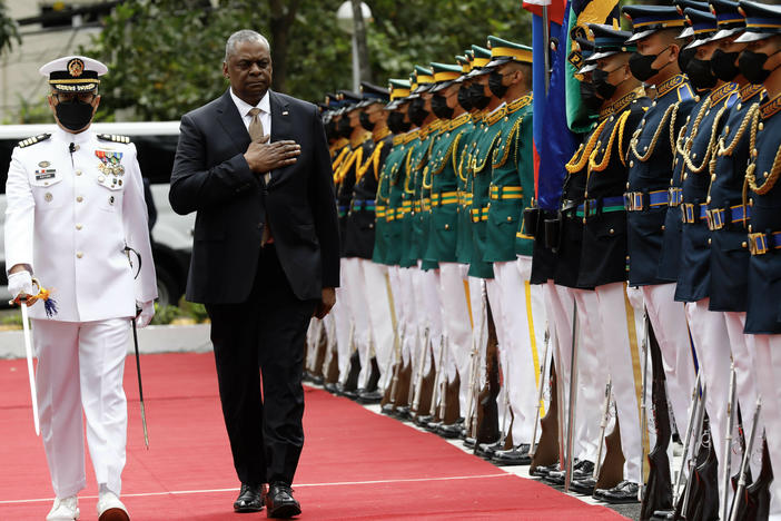 United States Defense Secretary Lloyd Austin walks past military guards during arrival honors at the Department of National Defense in Camp Aguinaldo military camp on Feb. 2, 2023 in Quezon City, Manila, Philippines.