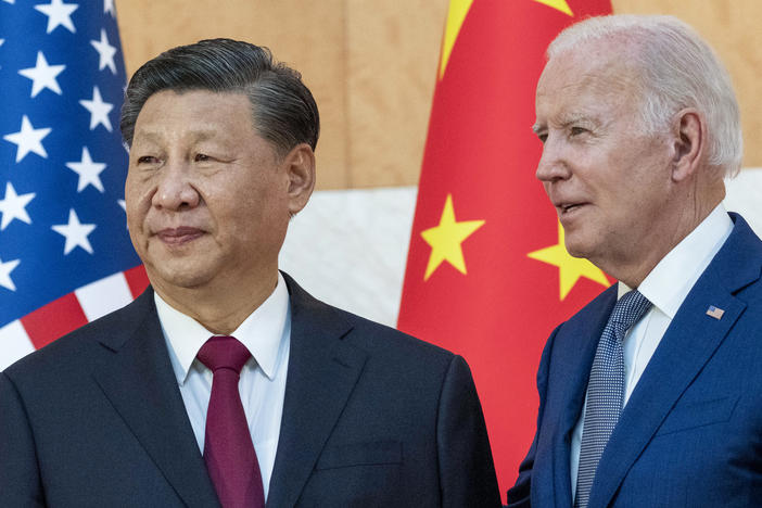 President Biden stands with Chinese President Xi Jinping before a meeting on the sidelines of the G-20 summit meeting, Nov. 14, 2022, in Bali, Indonesia.