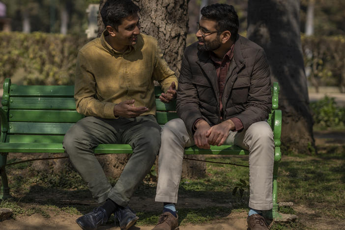 Indian couple Utkarsh Saxena, left, and Ananya Kotia, chat inside a public park in New Delhi, India, Jan. 18, 2023. The couple, now 15 years into their relationship, is joined by three other couples who have filed a petition to India's Supreme Court that seeks the legalization of same-sex marriage.