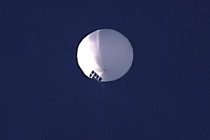 A high altitude balloon floats over Billings, Mont., on Wednesday, Feb. 1, 2023. The U.S. is tracking a suspected Chinese surveillance balloon that has been spotted over U.S. airspace for a couple days.