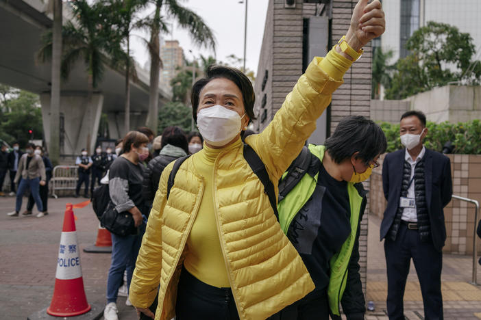 Pro-democracy activist Emily Lau Wai-hing gestures as she arrives at the West Kowloon Magistrates' Courts in Hong Kong, Monday, Feb. 6, 2023.
