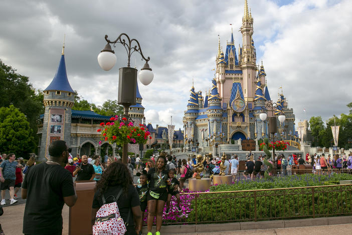 People visit Magic Kingdom Park at Walt Disney World Resort in Lake Buena Vista, Florida, on Friday, April 22, 2022.