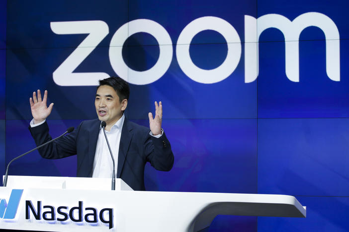 Zoom CEO and founder Eric Yuan speaks before the Nasdaq opening bell ceremony in April 2019. The company saw rapid growth during the pandemic but is now laying off about 15% of its workforce.