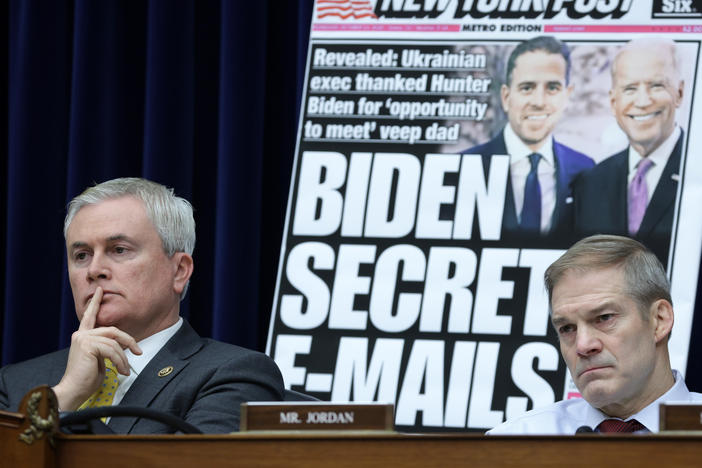 With a poster of a <em>New York Post</em> front page story about Hunter Biden's emails on display, Rep. James Comer (R-Ky.) and Rep. Jim Jordan (R-Ohio) listen during a hearing before the House Oversight and Accountability Committee on Feb. 8, 2023 in Washington, DC. The committee held a hearing on Twitter's short-lived decision to limit circulation of the <em>Post </em>story in 2020.
