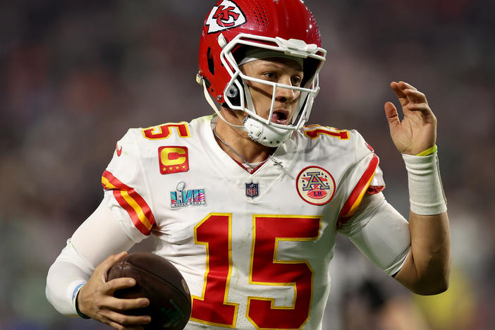 Quarterback Patrick Mahomes of the Kansas City Chiefs scrambles against the Philadelphia Eagles during the third quarter in Super Bowl LVII at State Farm Stadium on February 12, 2023 in Glendale, Ariz.