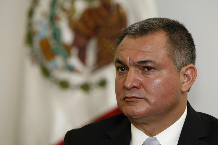 In this Oct. 8, 2010 file photo, Mexico's Secretary of Public Safety Genaro Garcia Luna attends a press conference on the sidelines of an American Police Community meeting in Mexico City. Garcia Luna, who is in custody and facing drug trafficking charges in New York, has been charged in a superseding indictment with continuing criminal enterprise.