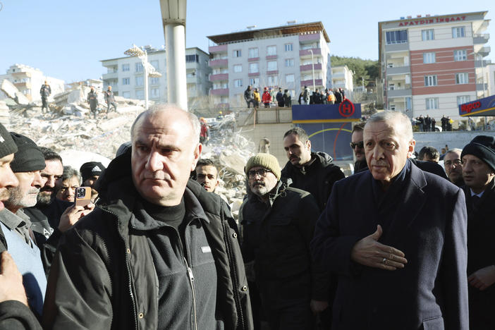 Turkey's President Recep Tayyip Erdogan visits the city center destroyed by last the Feb. 6 earthquake in Kahramanmaras, southern Turkey, on Feb. 8.