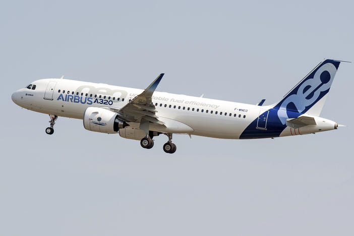 The new Airbus A320neo takes off for its first test flight at Toulouse-Blagnac airport in southwestern France on Sept. 25, 2014. The owner of Air India announced a deal Tuesday to buy 250 Airbus jets, including A350 wide-body planes and A320neo single-aisle planes in a deal worth billions of dollars.