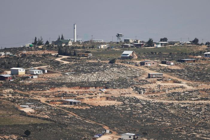 A picture taken from the Palestinian village of Aqraba shows the Israeli settlement outpost of Gevat Arnon, near Nablus city in the southern occupied West Bank.