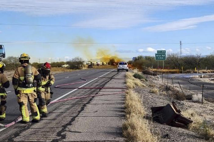 An accident involving a commercial tanker truck caused a hazardous material to leak onto Interstate 10 outside Tucson, Ariz., on Tuesday, prompting state troopers to shut down traffic on the freeway.