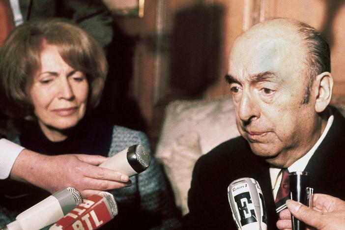Chilean writer, poet and diplomat Pablo Neruda answers journalists' questions in 1971.