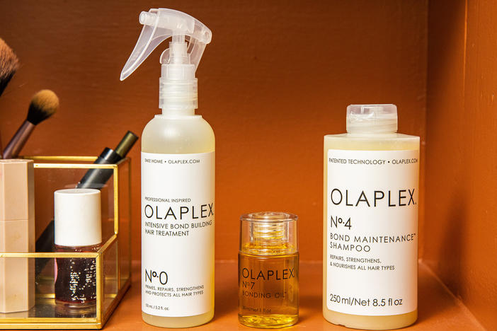 Bottles of Olaplex hair care products are arranged in Denver, on Dec. 8, 2022. A lawsuit claims Olaplex products contain allergens and irritants that cause hair loss and dry, brittle hair.