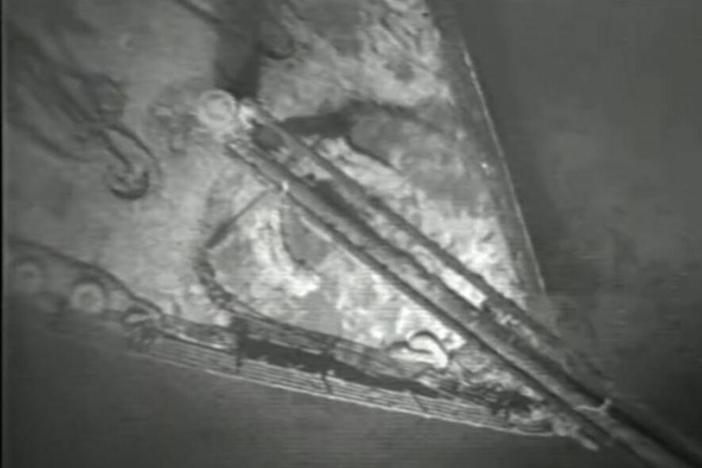 In this screenshot captured by NPR, the bow of the shipwrecked Titanic is seen from the first human-operated vehicle to visit the site in 1986. The Woods Hole Oceanographic Institution released footage from that 1986 dive on Wednesday.