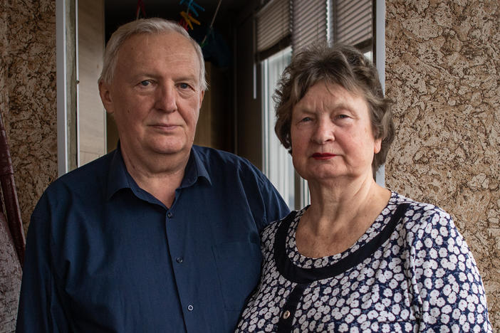 Tetiana Horobstova, 70, and her husband, Volodymyr, on the balcony of their home, where their daughter was talking on the phone when Russian soldiers came to arrest her in Kherson, Ukraine.