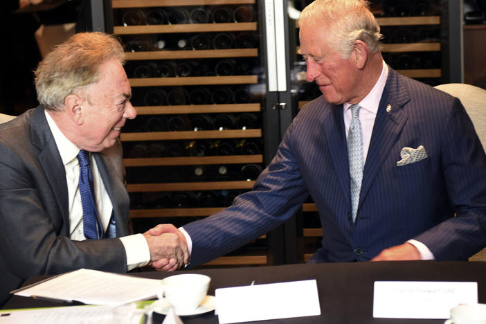 FILE - Britain's Prince Charles meets Andrew Lloyd Webber during a visit to the Royal Albert Hall to discuss the arts and creativity in school, in London, Wednesday, Sept. 5, 2018. Andrew Lloyd Webber, the English composer who created the scores for blockbuster musicals such as "Cats,'' "The Phantom of the Opera'' and "Evita,'' has written the anthem for King Charles III's coronation.