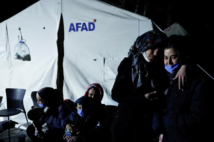 People in Antakya, Turkey, react after a new earthquake struck on Monday.