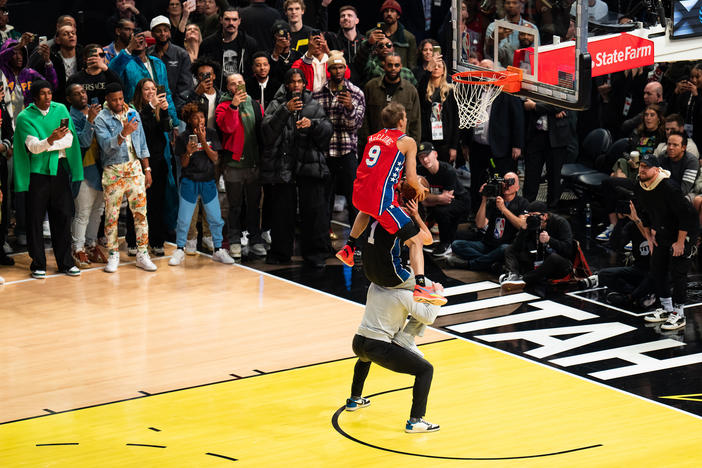 Mac McClung dunks the ball during the AT&T Slam Dunk Contest as part of 2023 NBA All-Star Weekend on Saturday.