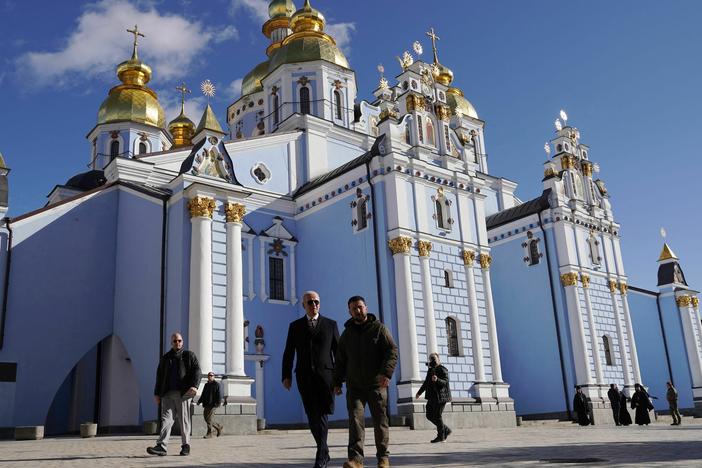 President Biden and Ukrainian President Volodymyr Zelenskyy walk in front of St. Michael's cathedral in Kyiv ahead of the anniversary of Russia's invasion of Ukraine.