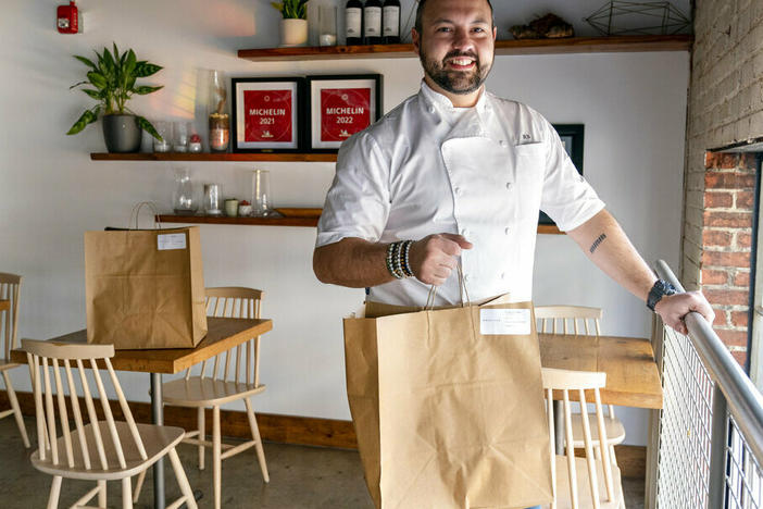 Matt Baker, chef and owner of Gravitas, poses for a portrait Feb. 14 inside the restaurant in Washington. Gravitas has a subscription service offering a monthly meal for two.