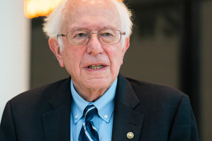 Sen. Bernie Sanders walks into NPR Headquarters in Washington D.C.