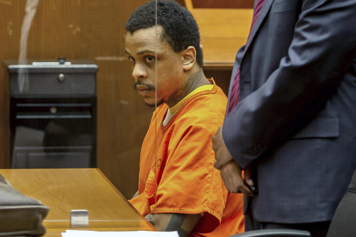 Eric R. Holder Jr. sits in the courtroom at Clara Shortridge Foltz Criminal Justice Center on Sept. 15, 2022, in Los Angeles. Holder, who was convicted last year of fatally shooting rapper Nipsey Hussle in 2019, was sentenced Wednesday to 60 years to life in prison.