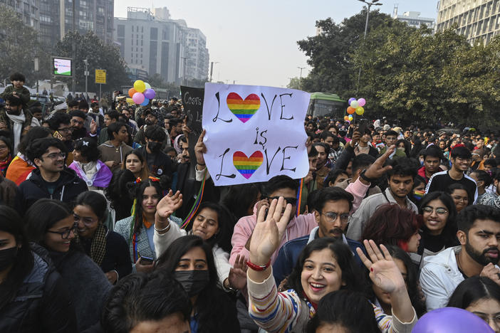 LGBTQ people and their supporters march demanding equal marriage rights in New Delhi, India, in January. India's Supreme Court in 2018 struck down a colonial-era law that made gay sex punishable by up to 10 years in prison but has yet to legalize same-sex marriages.