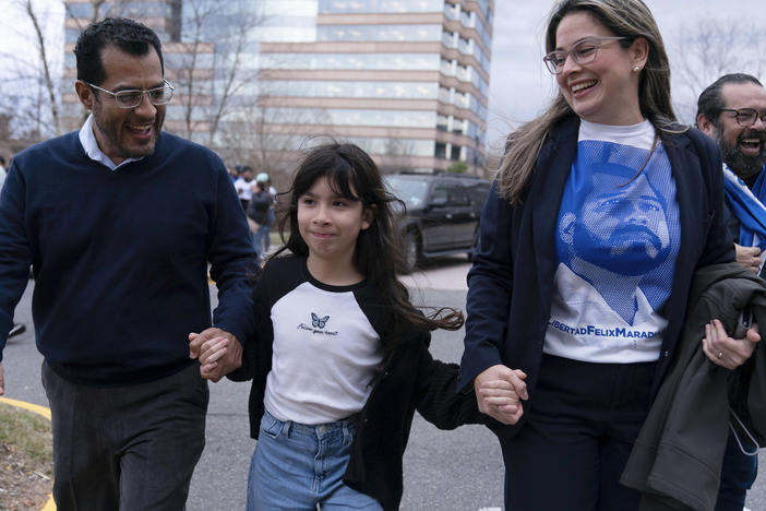 Former Nicaragua presidential candidate Felix Maradiaga reunits with his wife Berta Valle and his daughter Alejandra, walk together after Maradiaga arrived from Nicaragua at Washington Dulles International Airport, in Chantilly, Va., on Feb. 9.