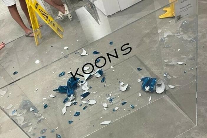 The "balloon dog" sculpture, pictured, shortly after it shattered.