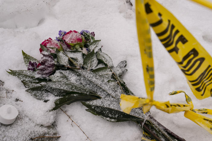 Flowers are seen outside the off-campus home where the quadruple murder took place in Moscow, Idaho.
