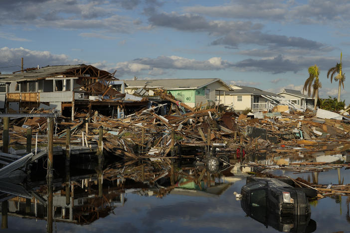 Debris along a canal in Fort Myers Beach, Fla., one week after Hurricane Ian. A new study warns that hurricanes are getting more dangerous because of climate change.