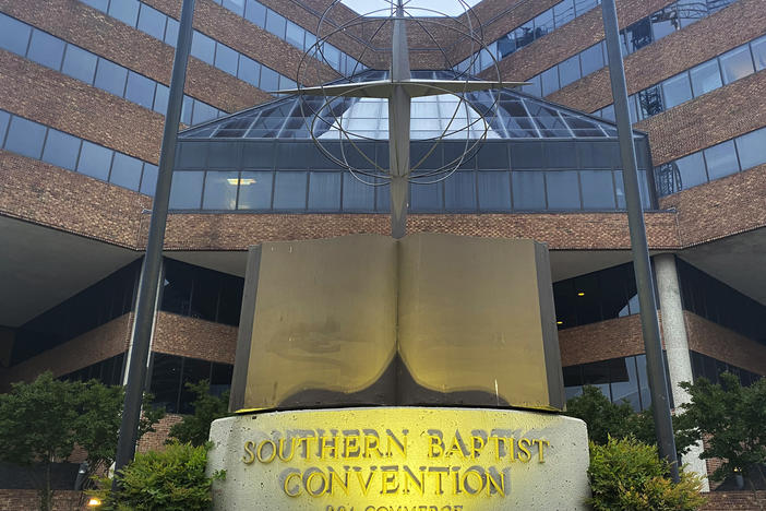 A cross and Bible sculpture stand outside the Southern Baptist Convention headquarters in Nashville, Tenn., in 2022.
