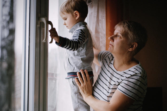 Elena Diachkova and her grandson Nikita, 3, in Poland. December 2022.