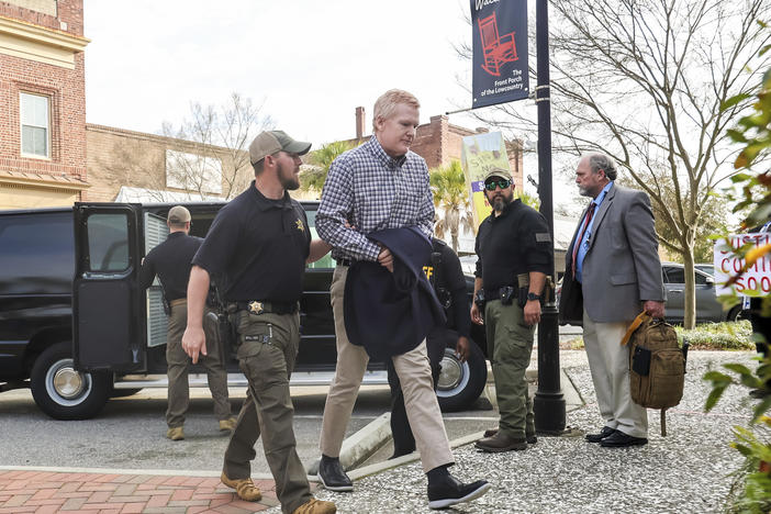Alex Murdaugh faces life in prison for the double murders of his wife and son. He's seen here being escorted into the the Colleton County Courthouse in Walterboro, S.C., on Monday.