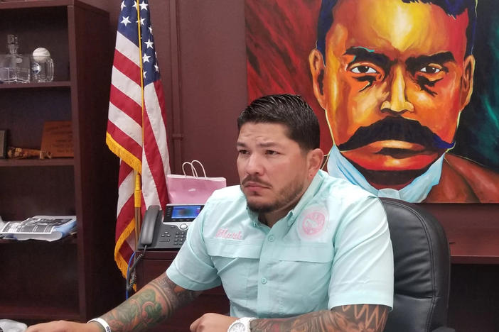 Nueces County District Attorney Mark Gonzalez studies past criminal cases his office has prosecuted, inside the county courthouse in Corpus Christi, Texas in 2019.