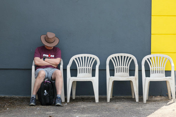 A spectator sleeps during IRONMAN Ireland, Cork on August 14, 2022 in Cork, Ireland.