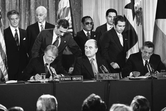 Officials sign the Panama Canal treaties Sept. 7, 1977, at the Pan American Union in Washington, D.C. From left: President Jimmy Carter; Organization of American States Secretary-General Alejandro Orfila; and Panama's head of government Omar Torrijos.