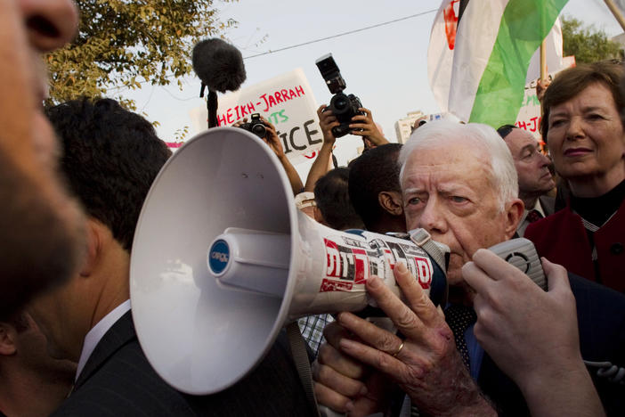 October 22, 2010: former president of Ireland, Mary Robinson, background right, looks at former U.S. president, Jimmy Carter, center, while visiting a weekly protest in the east Jerusalem neighborhood of Sheikh Jarrah. The protest was organized by groups supporting Palestinians evicted from their homes in east Jerusalem by Israeli authorities.