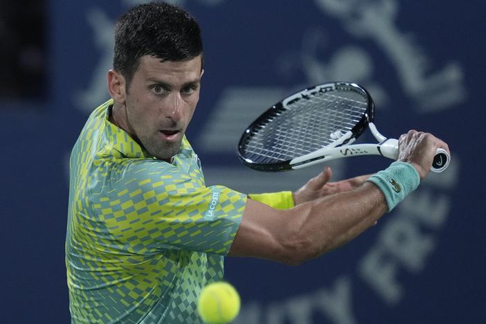 Serbia's Novak Djokovic returns the ball to Daniil Medvedev during their semi final match of the Dubai Duty Free Tennis Championships in Dubai, United Arab Emirates, on March 2.