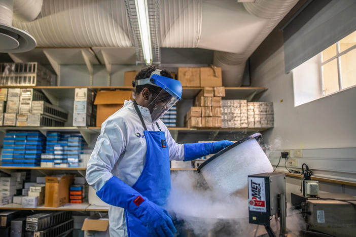 Munyaradzi Musvosvi, a researcher who works for the South African Tuberculosis Vaccine Initiative, in a storage facility at the University of Cape Town that holds in deep freeze the blood samples of people exposed to TB. He's part of a team working to develop a potential mRNA vaccine by looking at the immune cells in the blood samples.