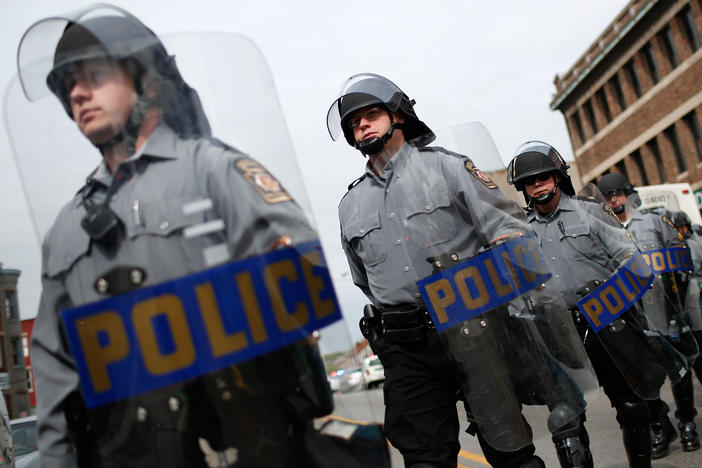 Pennsylvania state troopers deploy in Baltimore, Md, on May 1, 2015, following the release of a report on the death of Freddie Gray. Gray, 25, died April 19, 2015 from a severe spinal cord injury he received while in police custody.
