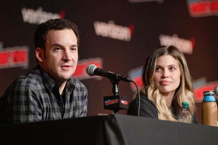 Ben Savage (left) and Danielle Fishel speak onstage at the Boy Meets World 25th Anniversary Reunion panel during New York Comic Con 2018. Savage announced this week he is running for Congress.
