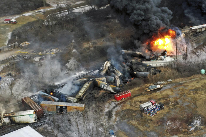 Portions of a Norfolk Southern freight train remained on fire Feb. 4 after derailing the previous day in East Palestine, Ohio.