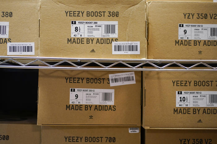 Boxes containing Yeezy shoes made by Adidas are seen at Laced Up, a sneaker resale store, in Paramus, N.J., on Oct. 25, 2022. Adidas' breakup with the rapper formerly known as Kanye West and the inability to sell his popular Yeezy line of shoes helped batter the company's earnings at the end of last year.