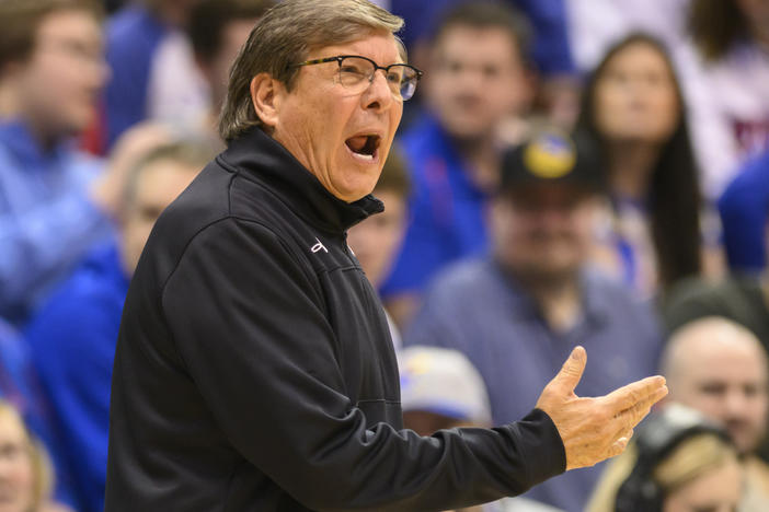 Texas Tech head coach Mark Adams calls instructions to his team against Kansas during a game in Lawrence, Kan., on Feb. 28.