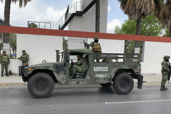 Mexican soldiers are seen preparing for a search mission for the kidnapped U.S. citizens in Matamoros earlier this week. Two of the Americans were killed, and Mexican authorities returned their bodies to the U.S. on Thursday.